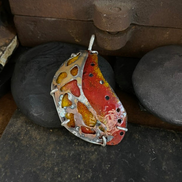 Intermediate metalsmithing Jewelry class hydraulic press, rolling mill